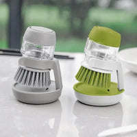 Brosse pour vaisselle avec réservoir et support