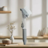 Brosse éponge avec réservoir