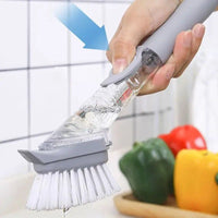 Brosse éponge avec réservoir